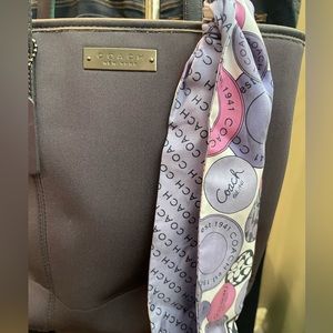 Purple Coach tote bag.